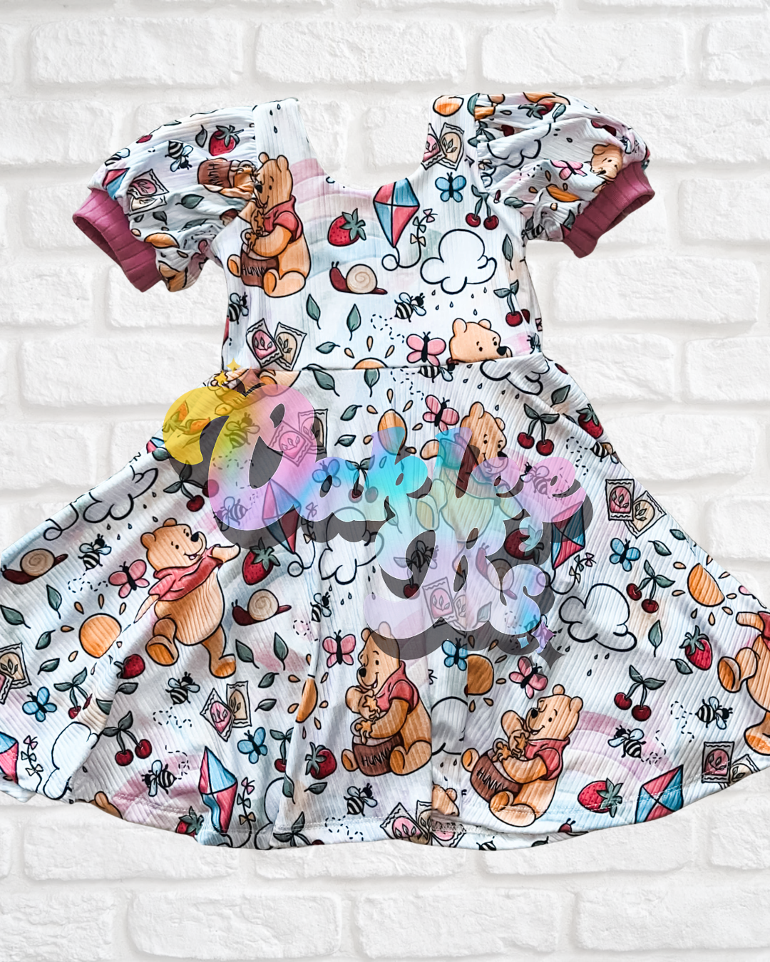 Honey Bear puff short sleeve knee length brielle dress with attached bummies